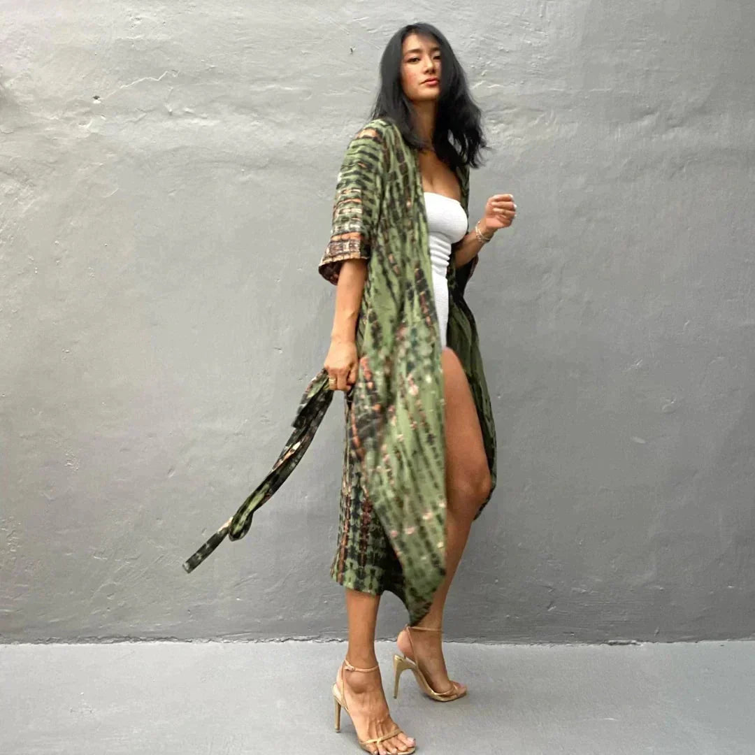 https://cdn.shopify.com/s/files/1/0828/5116/8594/files/genesis-stijlvolle-kimono-legergroen-973896_6f20b193-bf16-431a-8a62-7af512572845.webp?v=1728975848